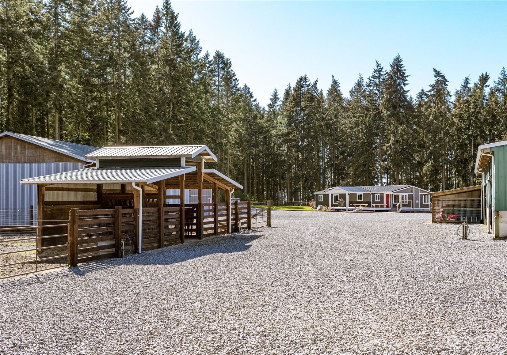 4656 Monkey Hill Road Oak Harbor, WA 98277 - Photo 25 of 40 a view of a house with a yard and covered with snow