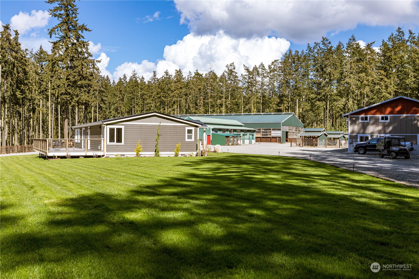 4656 Monkey Hill Road Oak Harbor, WA 98277 - Photo 27 of 40 a house view with a sitting space and garden space