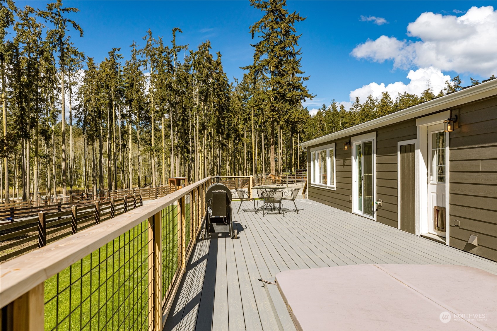 4656 Monkey Hill Road Oak Harbor, WA 98277 - Photo 28 of 40 a view of balcony and deck