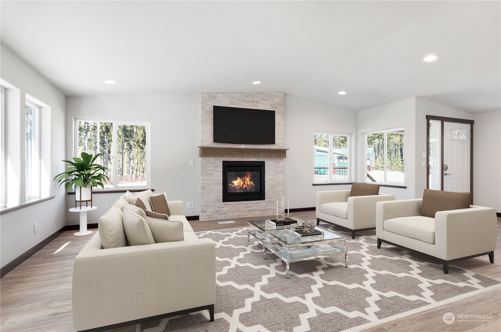 4656 Monkey Hill Road Oak Harbor, WA 98277 - Photo 30 of 40 a living room with furniture and a fireplace
