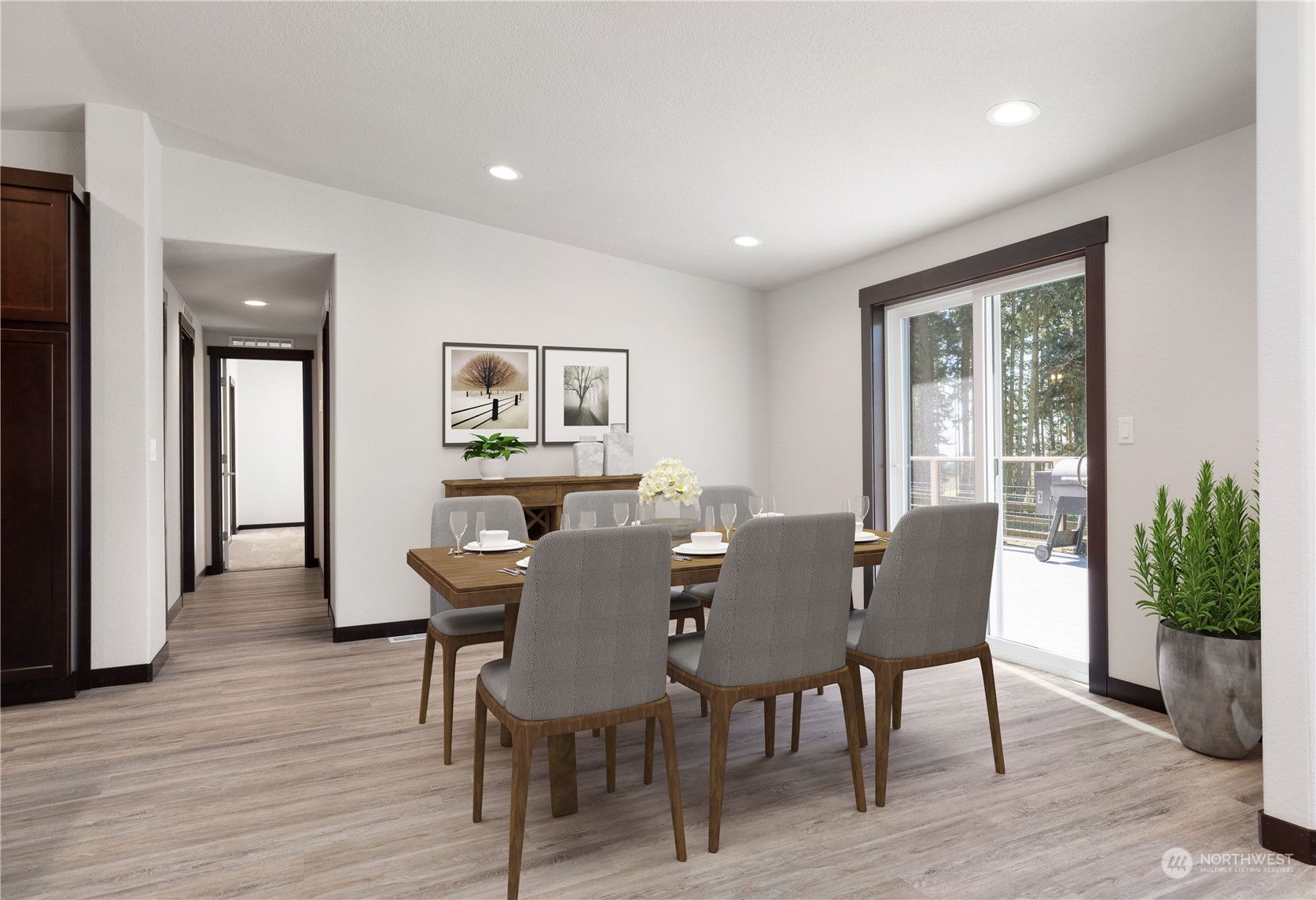 4656 Monkey Hill Road Oak Harbor, WA 98277 - Photo 33 of 40 a view of a dining room with furniture window and wooden floor