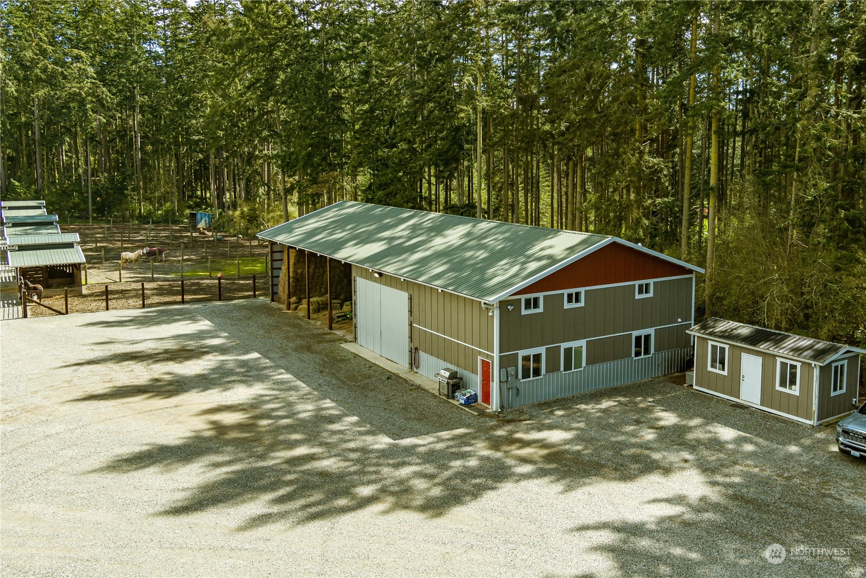 4656 Monkey Hill Road Oak Harbor, WA 98277 - Photo 6 of 40 a view of a house with a yard patio and deck