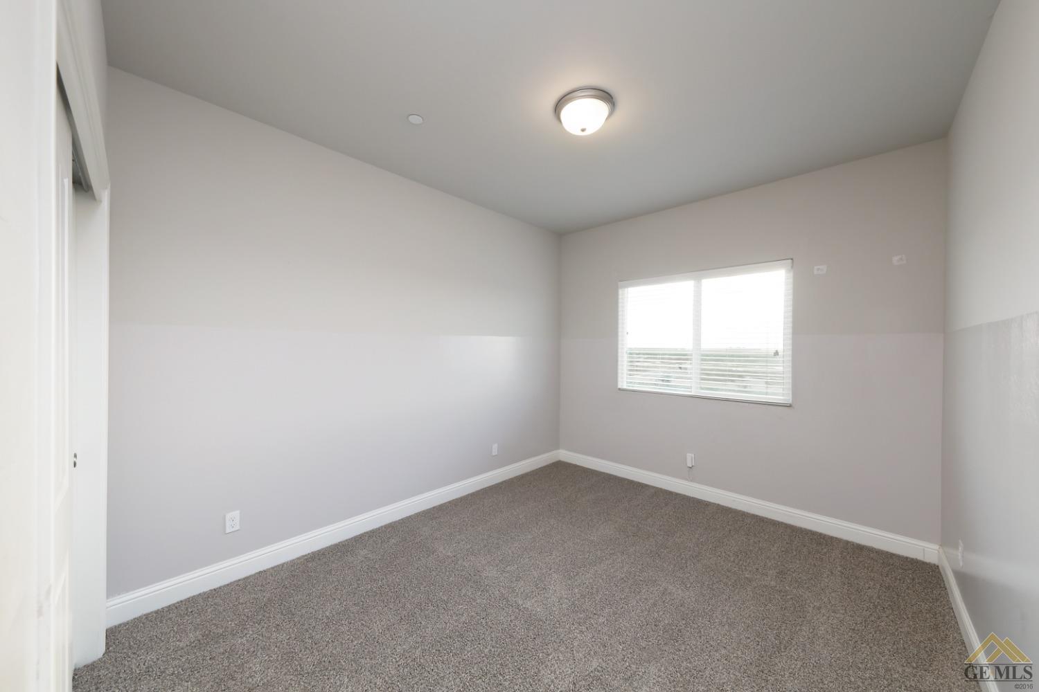 Undisclosed Address Shafter, CA 93263 - Photo 13 of 36 an empty room with a window