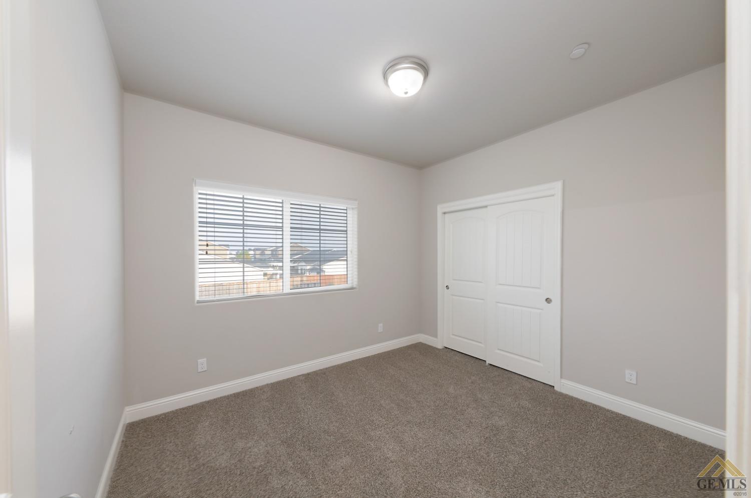 Undisclosed Address Shafter, CA 93263 - Photo 15 of 36 an empty room with a window