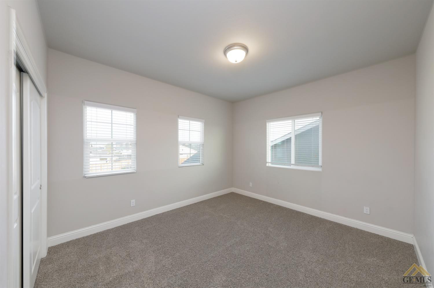 Undisclosed Address Shafter, CA 93263 - Photo 17 of 36 an empty room with a window