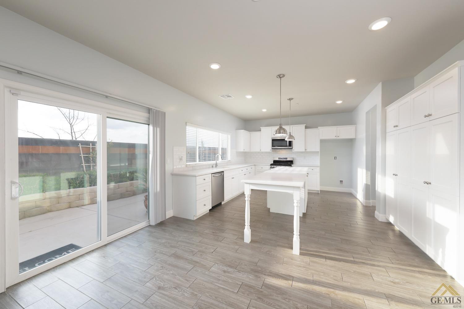Undisclosed Address Shafter, CA 93263 - Photo 26 of 36 a kitchen with a sink a counter top space and appliances