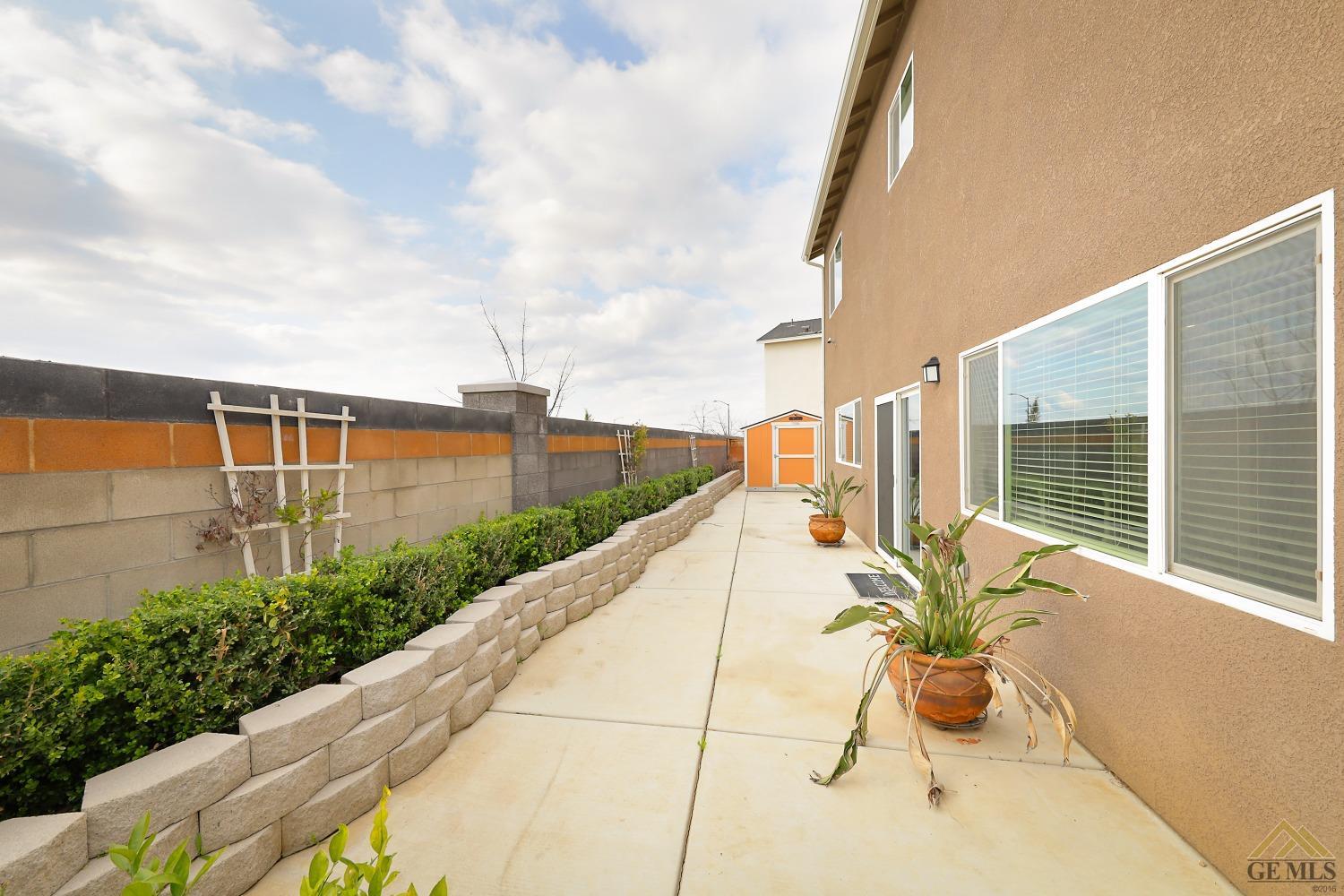 Undisclosed Address Shafter, CA 93263 - Photo 32 of 36 a view of swimming pool with outdoor seating