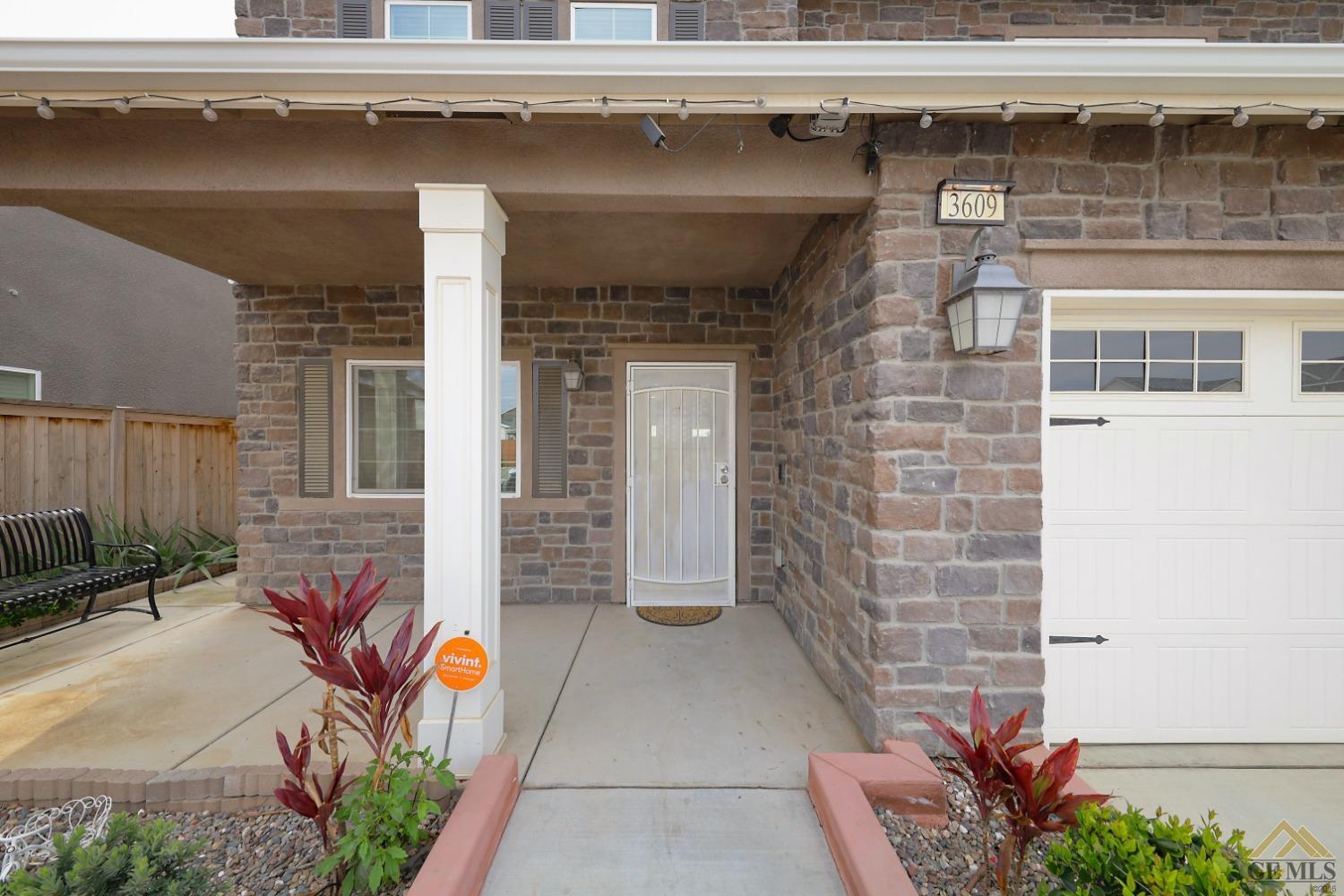 Undisclosed Address Shafter, CA 93263 - Photo 5 of 36 a front view of a house with a garage
