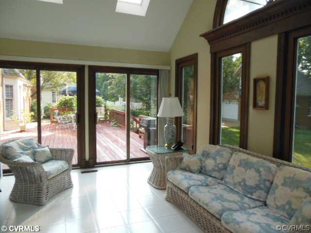 208 Rivers Bend Circle Chester, VA 23836 - Photo 18 of 24 Atrium - The bright and airy sunroom opens up to t