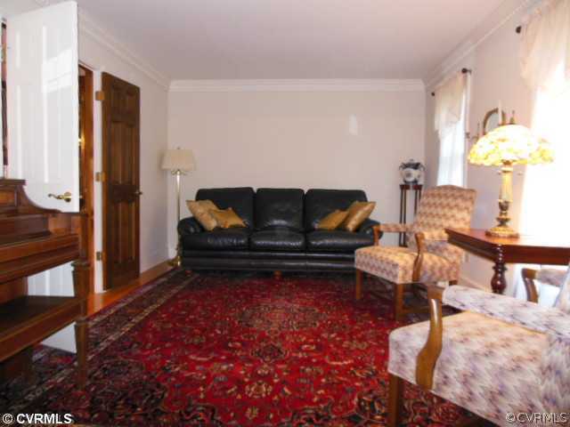 Living Room - The elegant living room is done in h