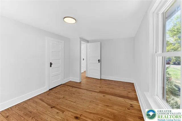 a view of an empty room and window