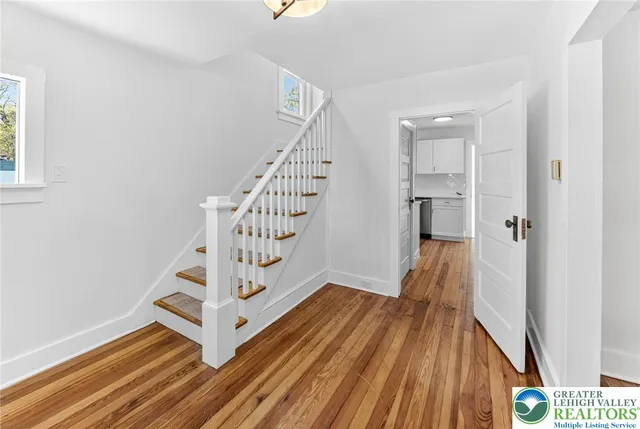 a view of entryway with wooden floor