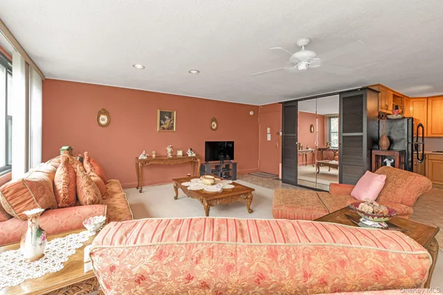 a bedroom with furniture and wooden floor