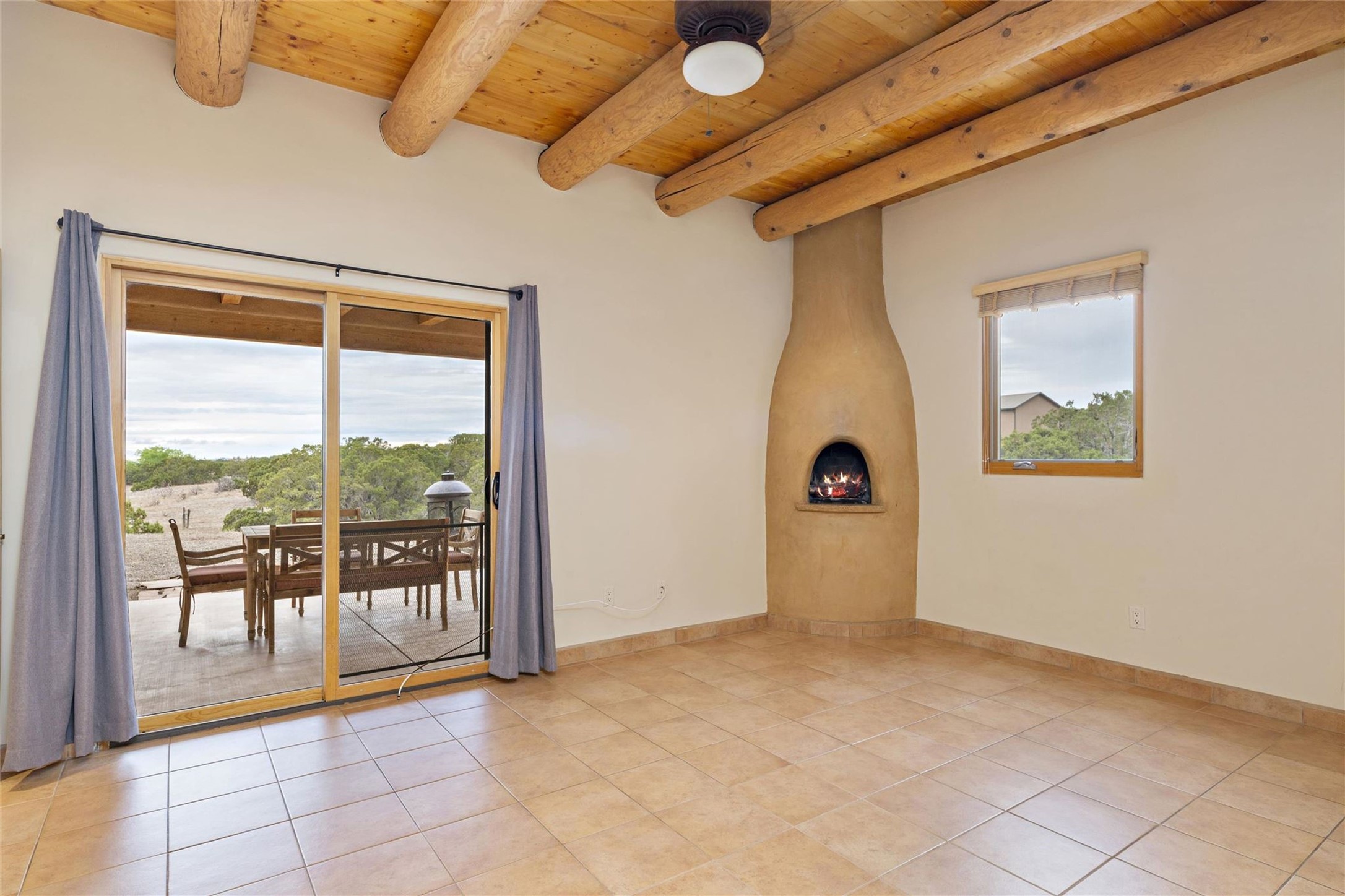 5 Rico Court Santa Fe, NM 87508 - Photo 12 of 32 Primary bedroom with kiva