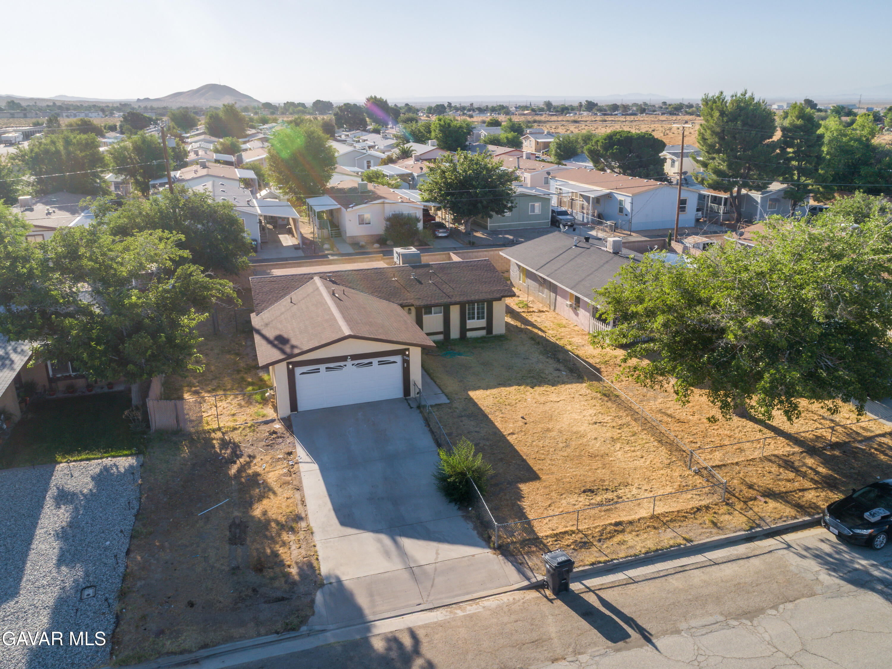 3340 West Roxbury Street Rosamond, CA 93560 - Photo 4 of 20 a view of a city from a terrace