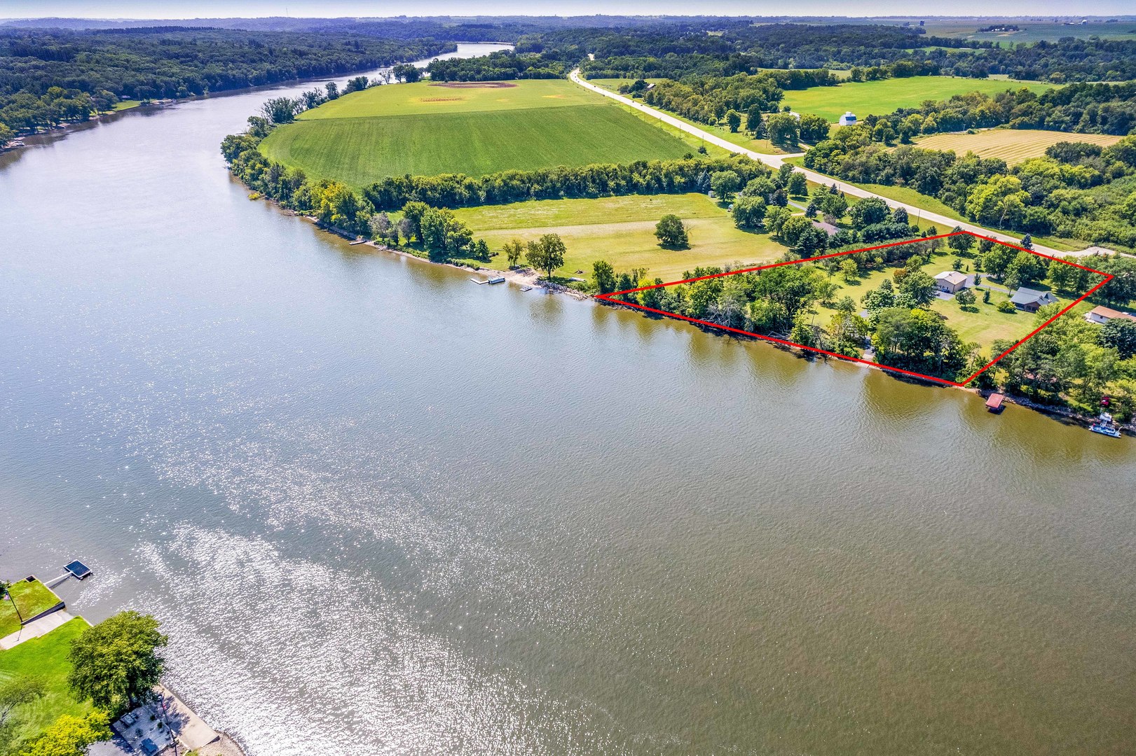 4151 Highway 2 Oregon, IL 61061 - Photo 1 of 30 an aerial view of residential houses with outdoor space and lake view