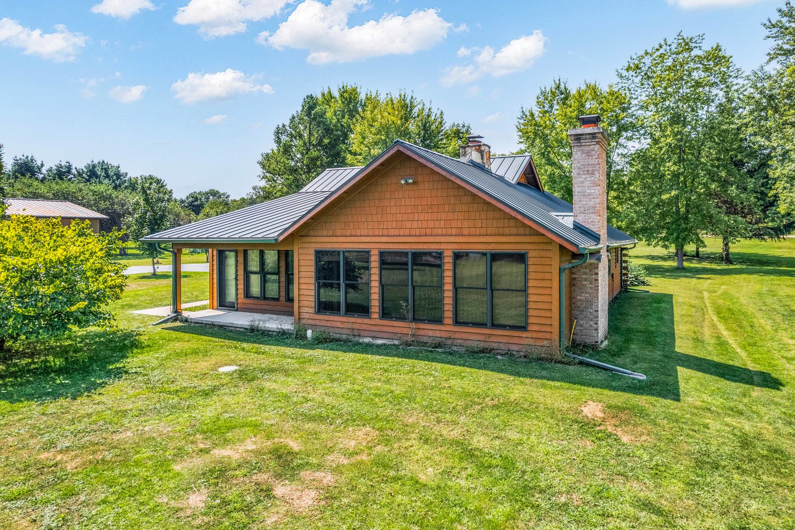 4151 Highway 2 Oregon, IL 61061 - Photo 11 of 30 a view of a house with a yard and large tree