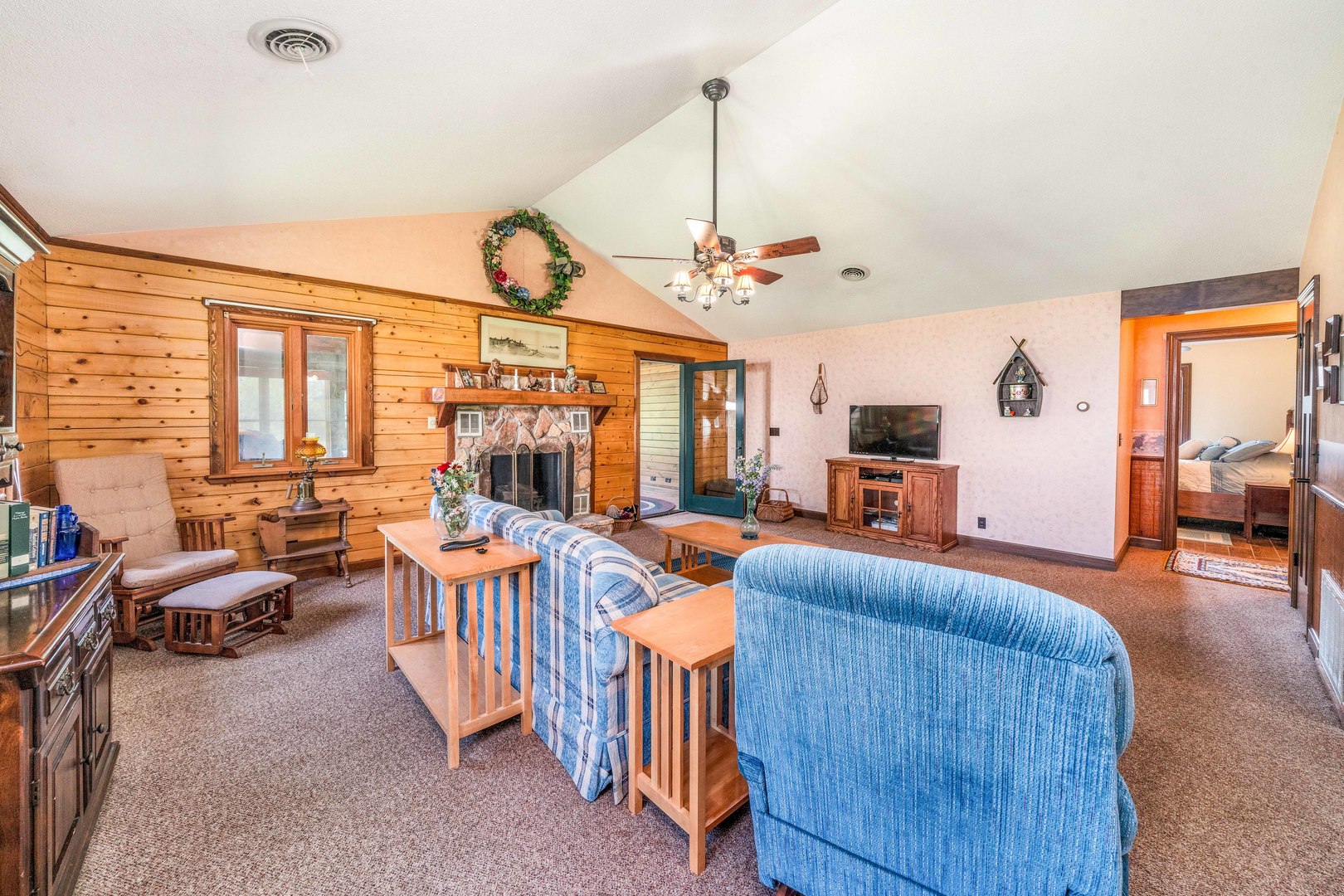 4151 Highway 2 Oregon, IL 61061 - Photo 16 of 30 a living room with furniture and a chandelier