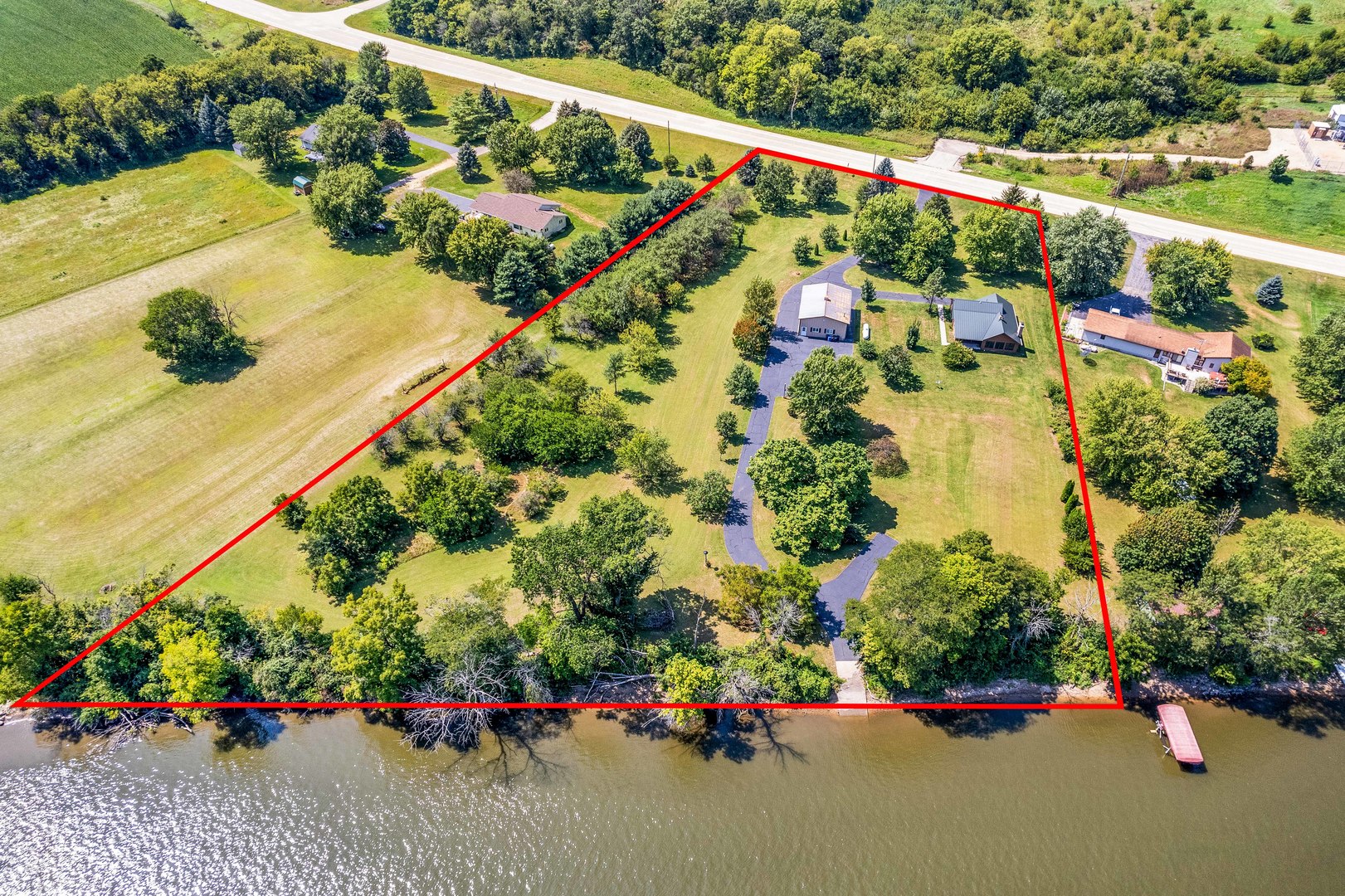 4151 Highway 2 Oregon, IL 61061 - Photo 2 of 30 a view of a garden with flowers and plants