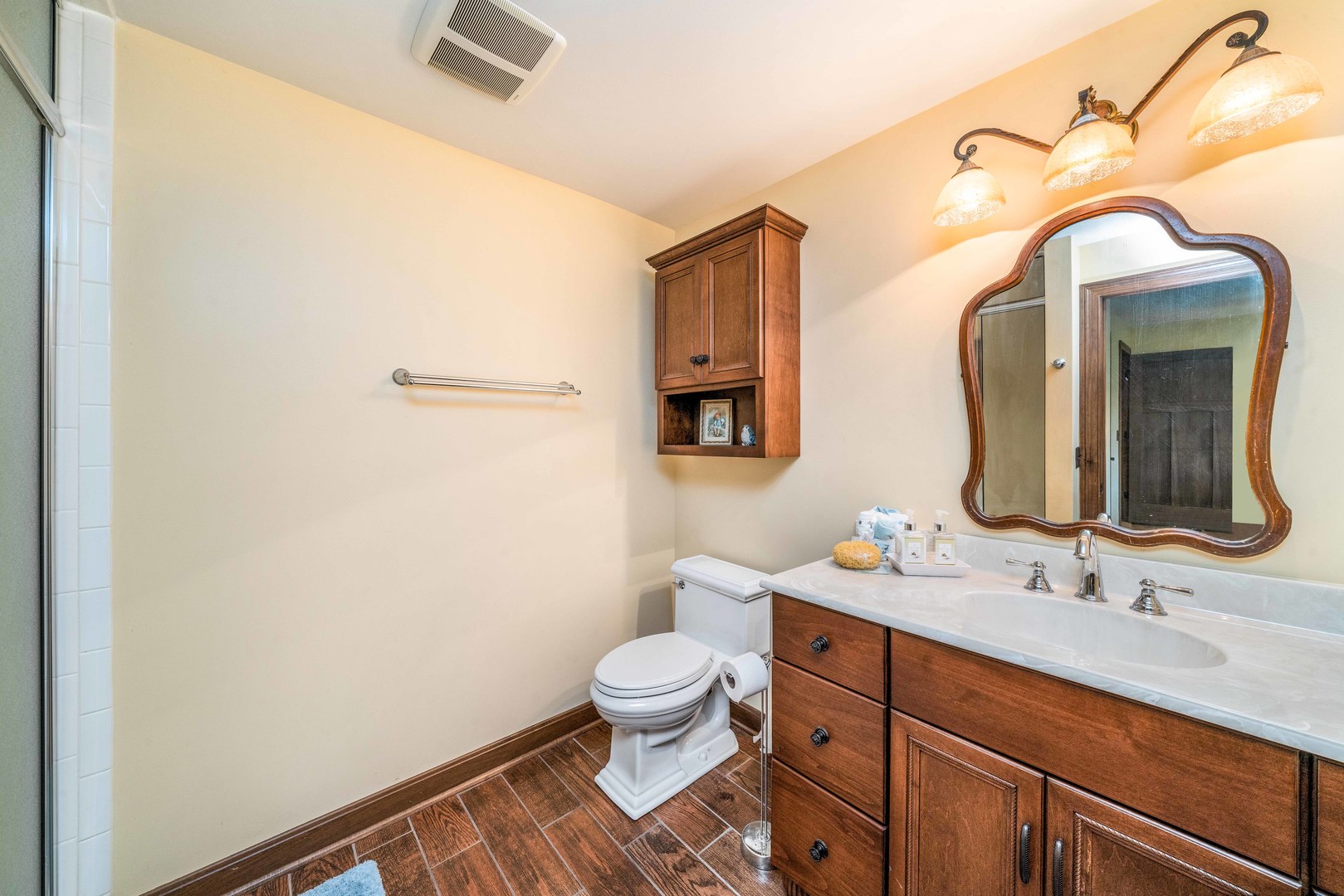 4151 Highway 2 Oregon, IL 61061 - Photo 24 of 30 a bathroom with a sink a toilet and a mirror