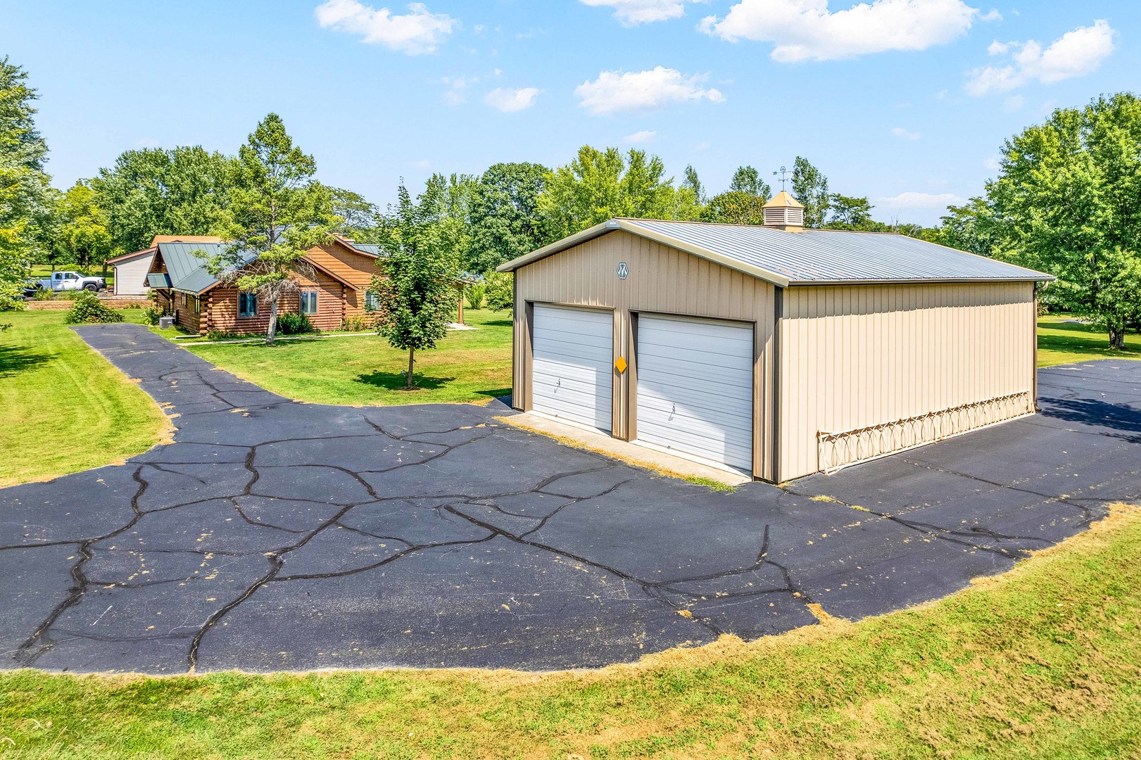 4151 Highway 2 Oregon, IL 61061 - Photo 27 of 30 a view of a house with a yard and potted plants