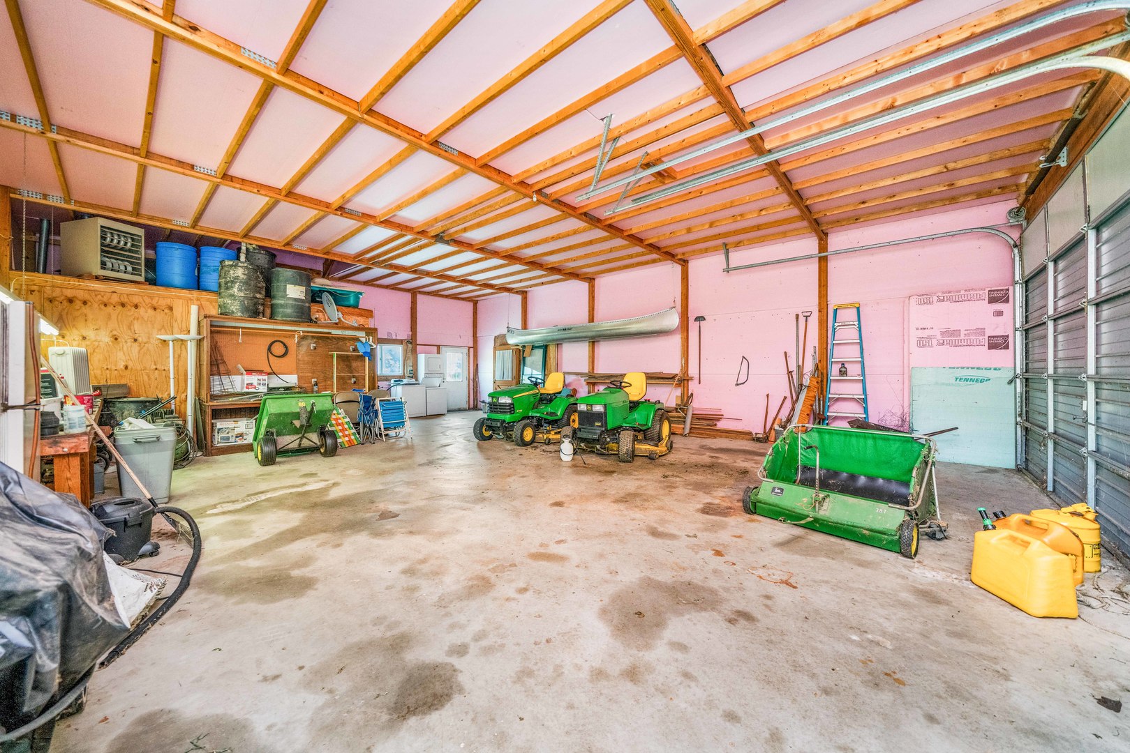 4151 Highway 2 Oregon, IL 61061 - Photo 30 of 30 a room with potted plants and a wooden bench