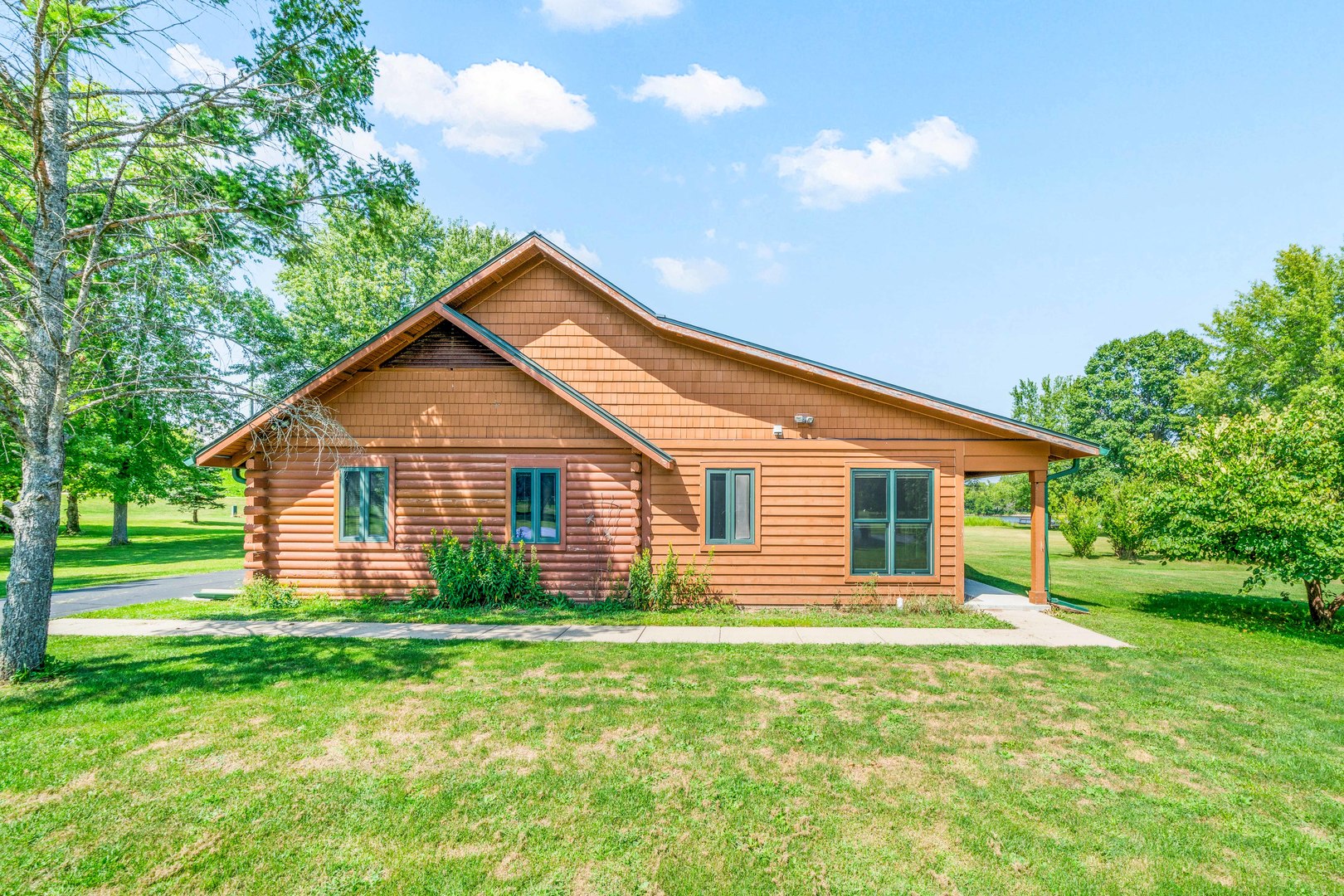 4151 Highway 2 Oregon, IL 61061 - Photo 9 of 30 a view of a house with yard and a garden