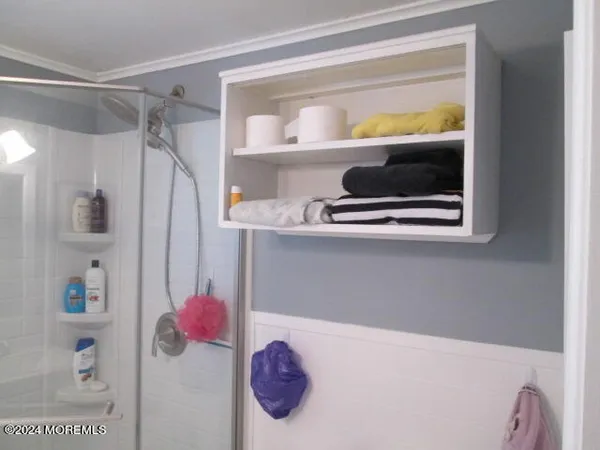 a bathroom with a sink and a shower