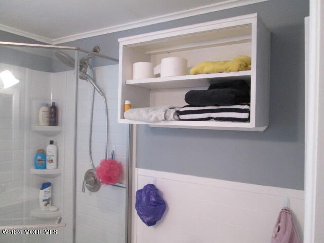 26 Malibu Road Lavallette, NJ 08735 - Photo 13 of 18 a bathroom with a sink and a shower