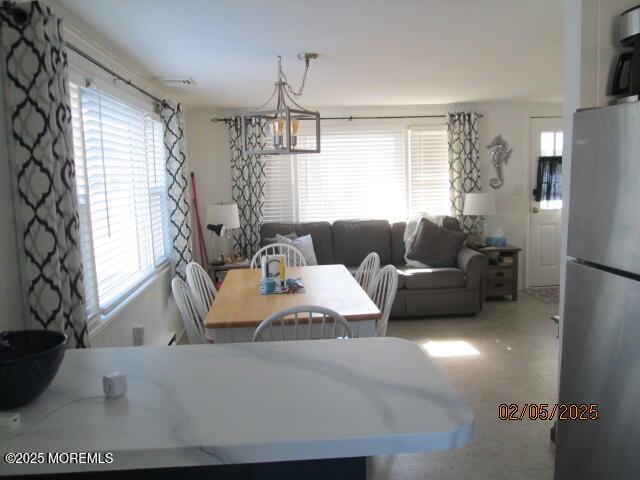 26 Malibu Road Lavallette, NJ 08735 - Photo 4 of 18 a living room with furniture and a window