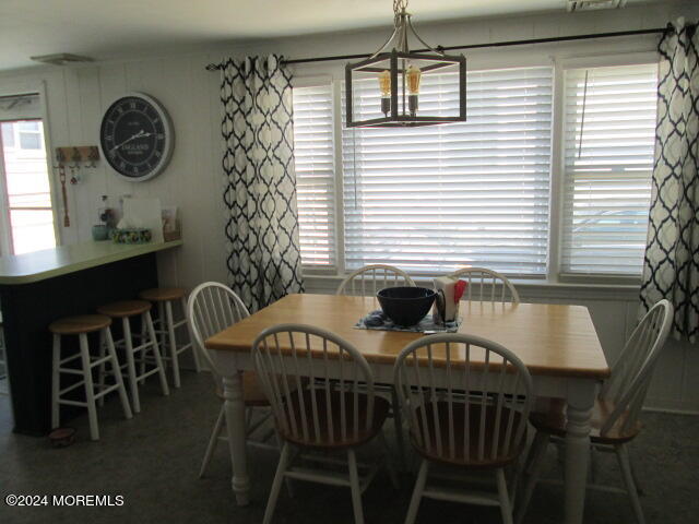26 Malibu Road Lavallette, NJ 08735 - Photo 6 of 18 a view of a dining room with furniture and window