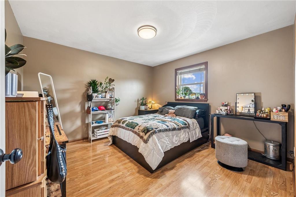 211 Huckleberry Road Indiana, PA 15701 - Photo 25 of 50 a bedroom with a bed and wooden floor