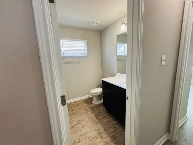 a bathroom with a tub and shower