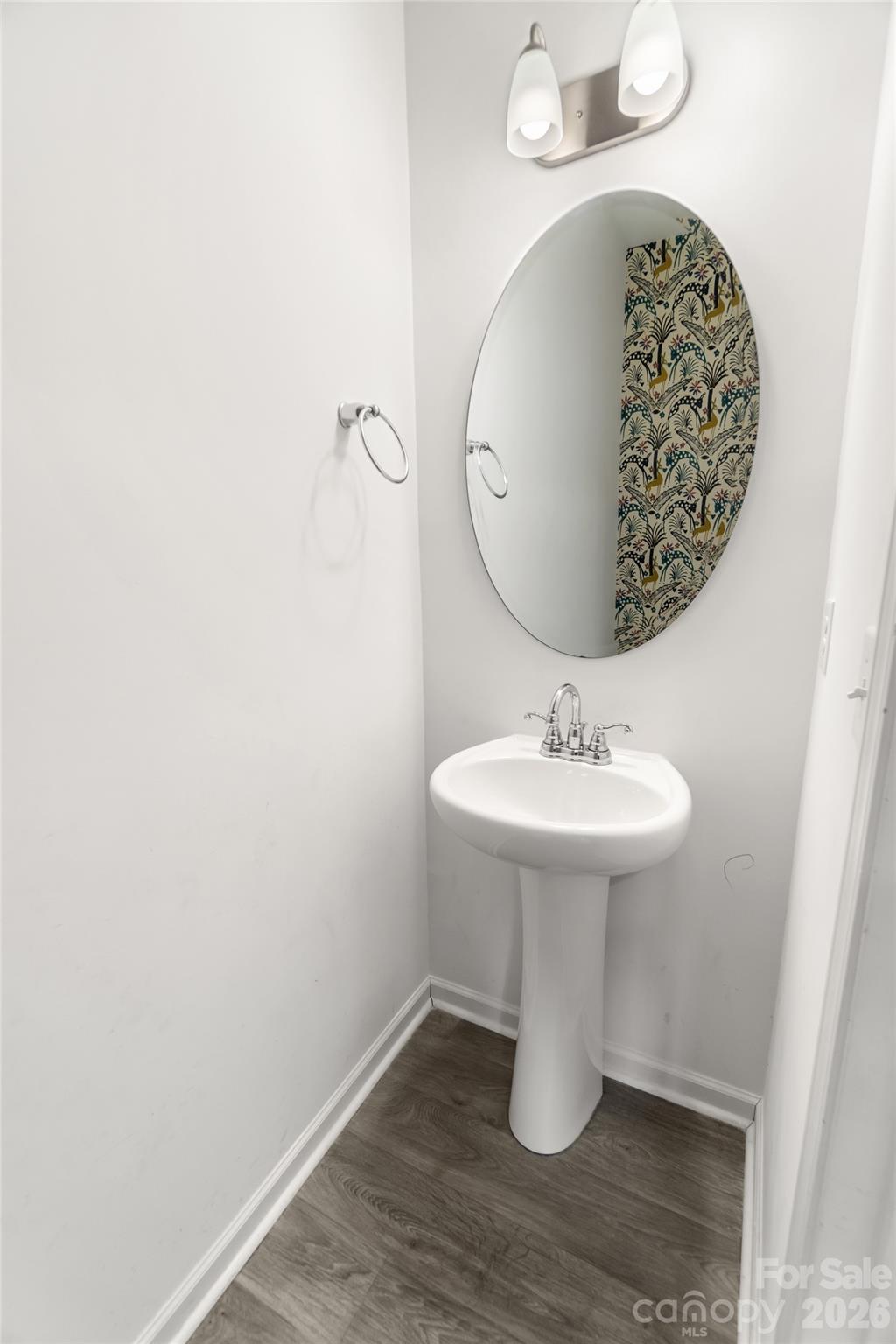 108 Aspire Circle Wingate, NC 28174 - Photo 16 of 31 a bathroom with a sink and mirror