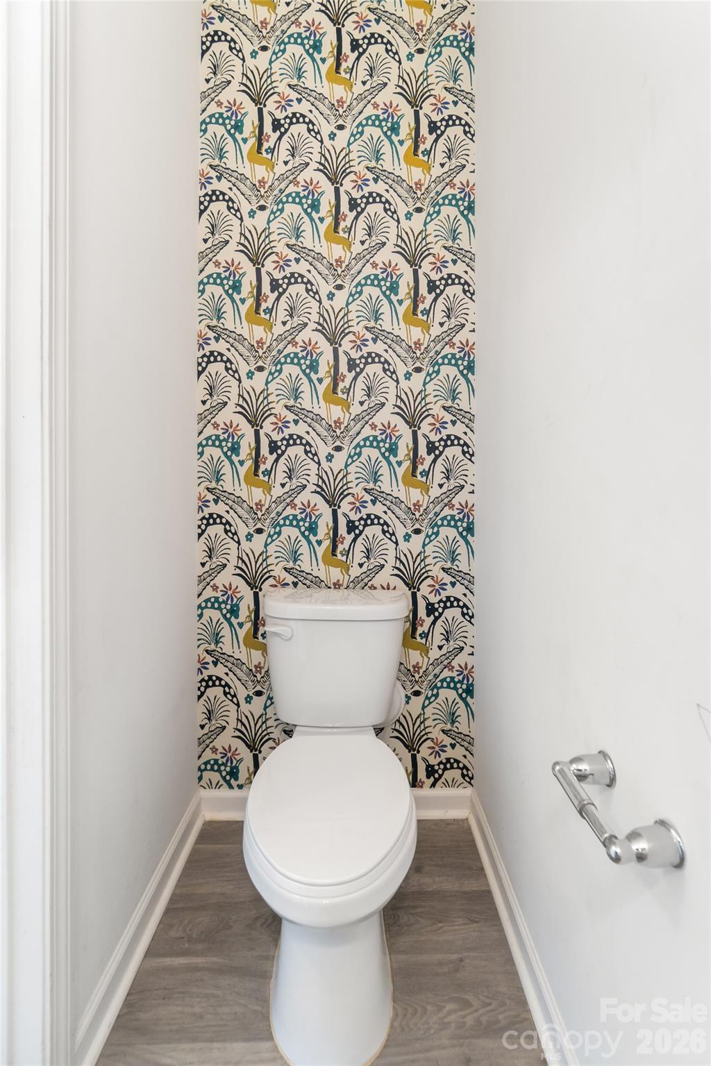 108 Aspire Circle Wingate, NC 28174 - Photo 17 of 31 a white toilet sitting next to a shower curtain
