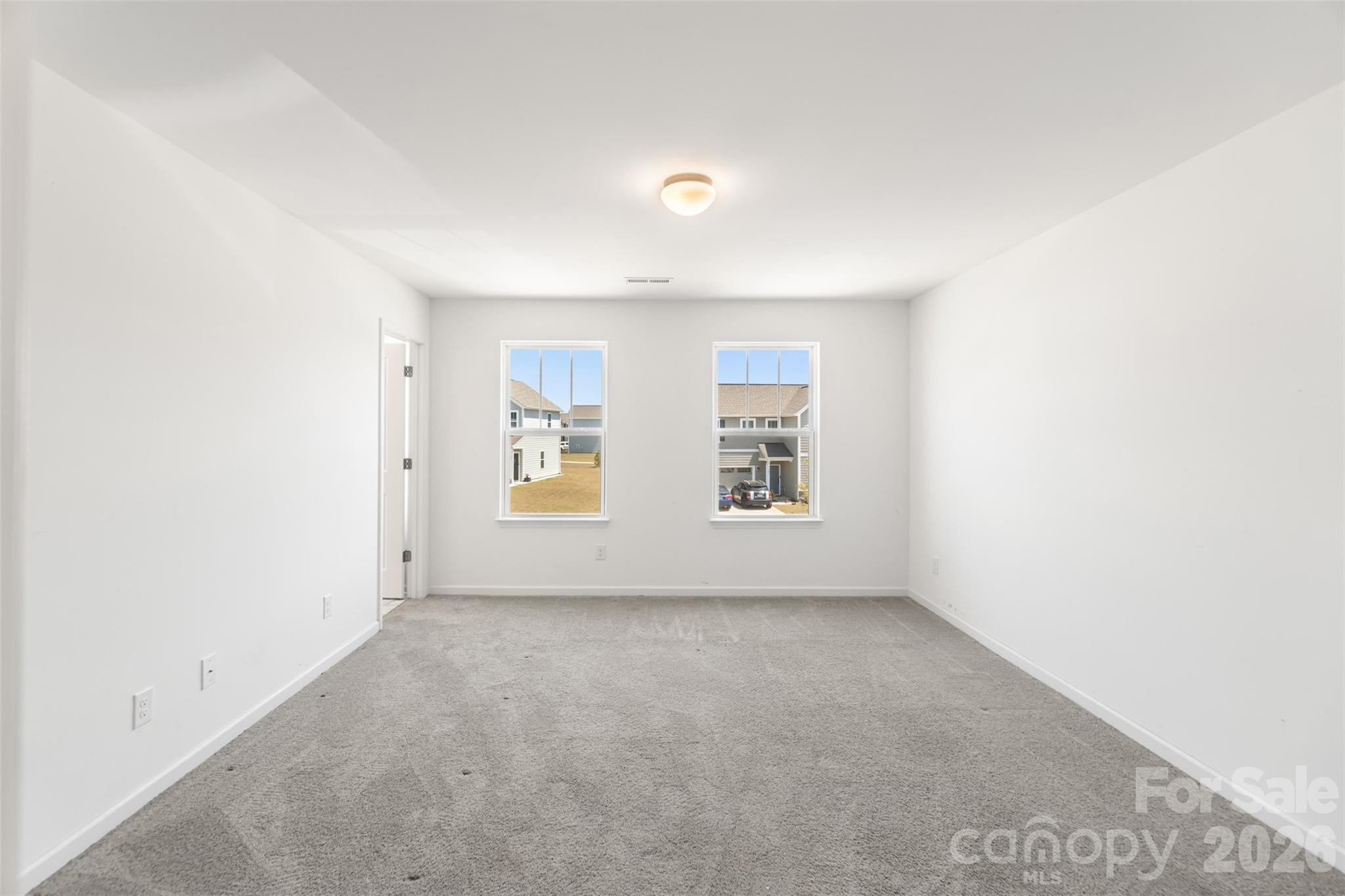 108 Aspire Circle Wingate, NC 28174 - Photo 19 of 31 an empty room with windows
