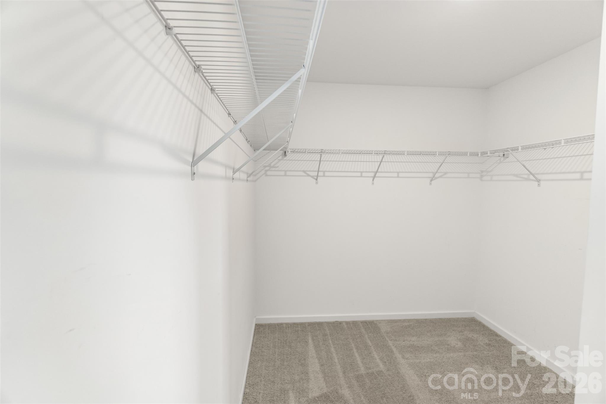 108 Aspire Circle Wingate, NC 28174 - Photo 22 of 31 a view of a room with racks on the wall