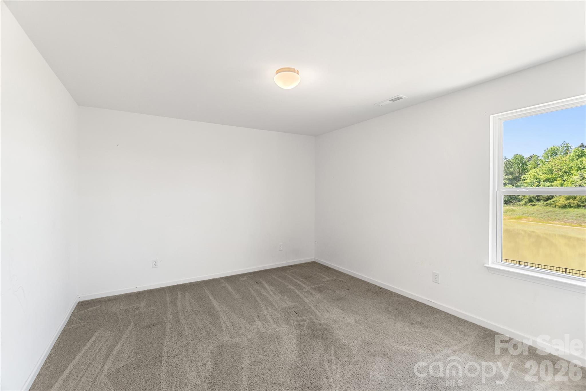 108 Aspire Circle Wingate, NC 28174 - Photo 24 of 31 an empty room with a window