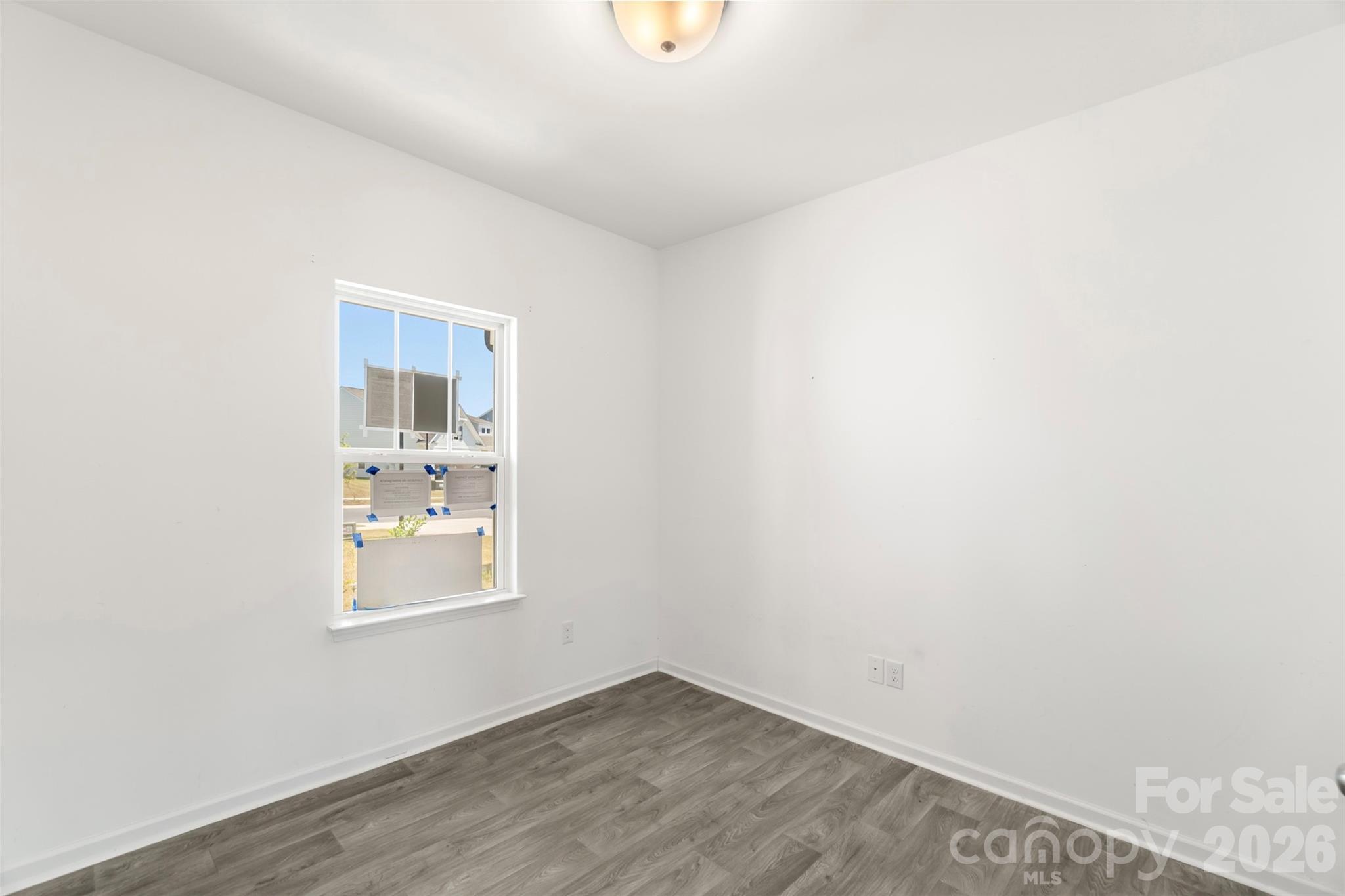 108 Aspire Circle Wingate, NC 28174 - Photo 8 of 31 an empty room with windows