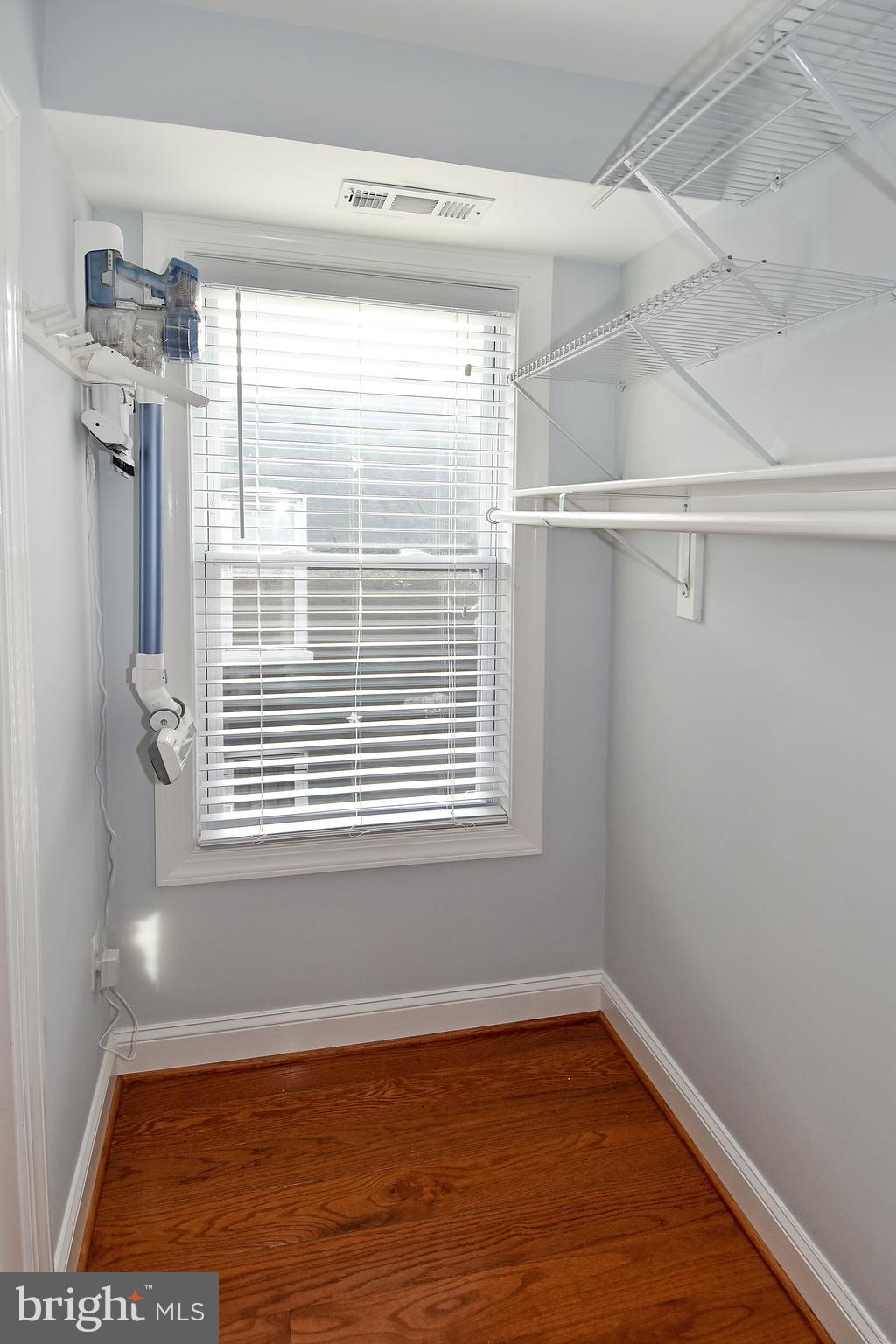 1117 Montello Avenue Northeast Washington, DC 20002 - Photo 25 of 64 a view of empty room with wooden floor and fan