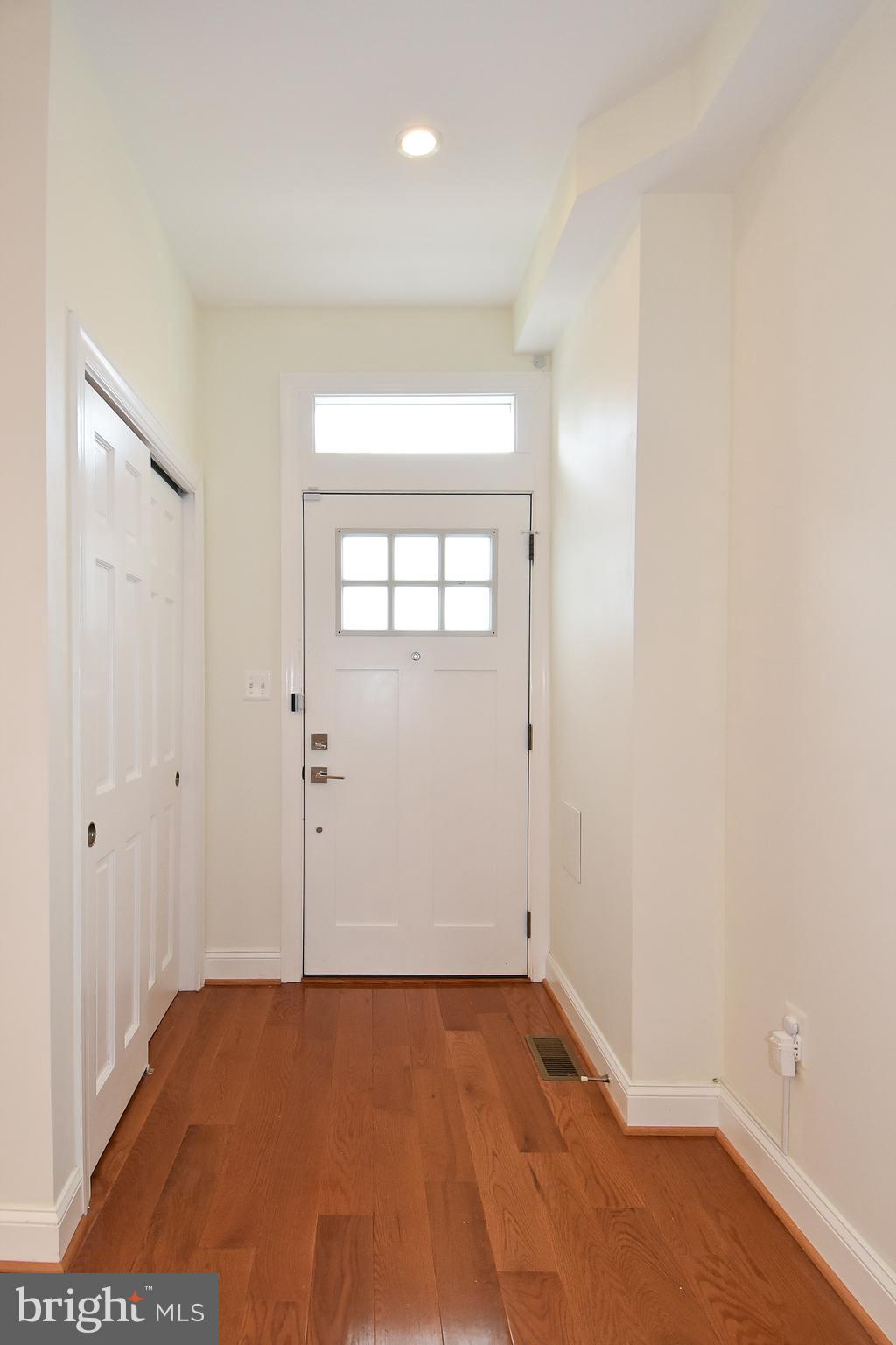 1117 Montello Avenue Northeast Washington, DC 20002 - Photo 3 of 64 an empty room with a empty space and windows