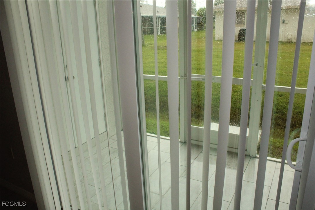 1110 Southwest 47th Terrace, Unit 102 Cape Coral, FL 33914 - Photo 12 of 13 a view of a bathroom from a corridor