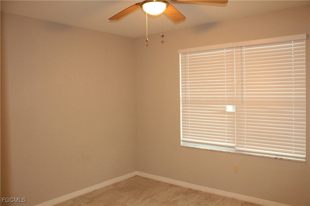1110 Southwest 47th Terrace, Unit 102 Cape Coral, FL 33914 - Photo 9 of 13 a view of a small space with a window