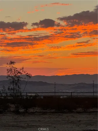 a view of lake with mountain