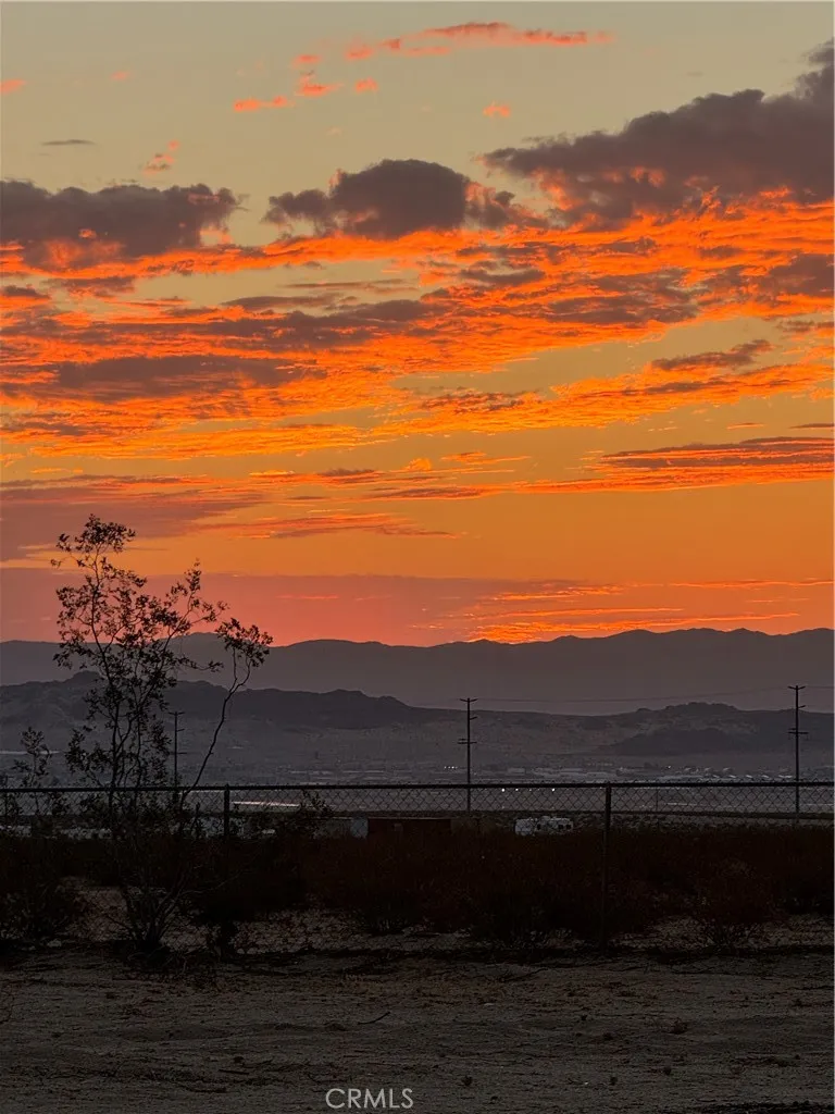 a view of lake with mountain