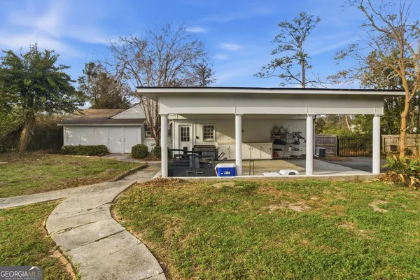 front view of a house with a big yard