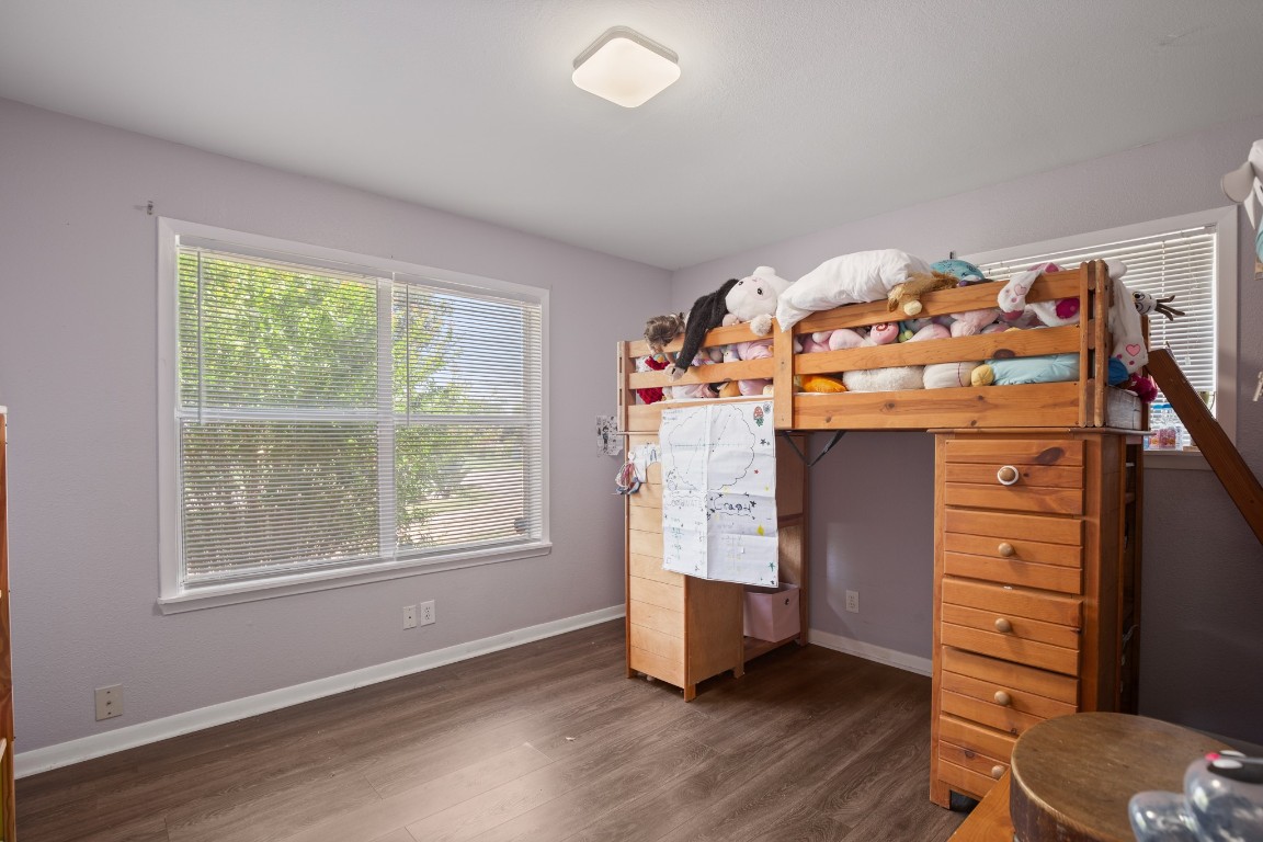 101 Homestead Road Kyle, TX 78640 - Photo 12 of 29 an empty room with windows and closet