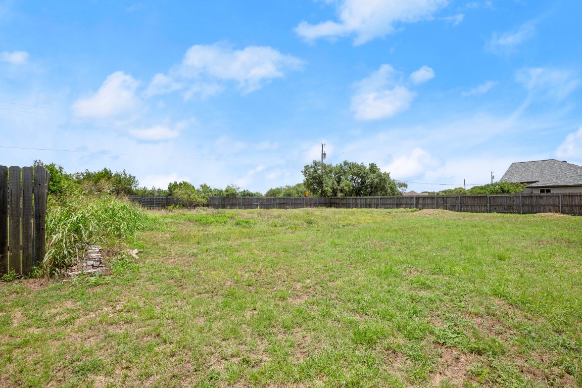 101 Homestead Road Kyle, TX 78640 - Photo 20 of 29 a view of yard with ocean view