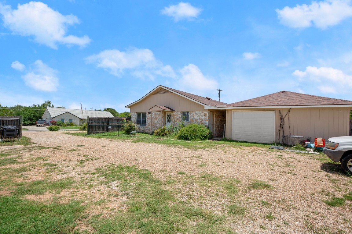 101 Homestead Road Kyle, TX 78640 - Photo 27 of 29 a front view of a house with a yard