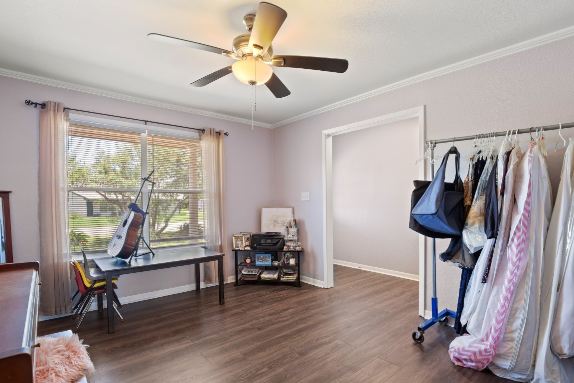 101 Homestead Road Kyle, TX 78640 - Photo 10 of 29 a living room with furniture and a window